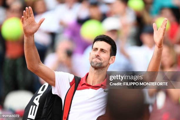 Serbia's Novak Djokovic celebrates after winning his match against Georgia's Nikoloz Basilashvili during Rome's ATP Tennis Open tournament at the...