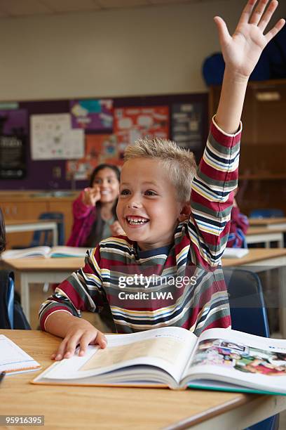 Boy Rasing Hand Boy Student Raising His Hand Photos and Premium High Res Pictures ...