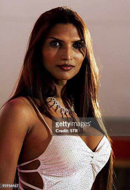 Malaika, one of the winners of the Indian Super Queen Contest for Transgenders, poses for a photograph at the competition in Chennai on January 21,...