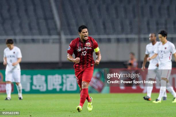 Shanghai FC Forward Hulk celebrates scoring a goal during the AFC Champions League Round of 16 match between Shanghai SIPG v Kashima Antlers at the...