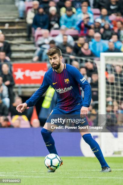 Gerard Pique Bernabeu of FC Barcelona in action during the La Liga match between Barcelona and Valencia at Camp Nou on April 14, 2018 in Barcelona,...