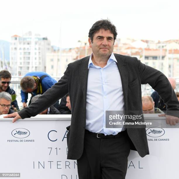 Director Romain Goupil attends "La Traversee" Photocall during the 71st annual Cannes Film Festival at Palais des Festivals on May 16, 2018 in...