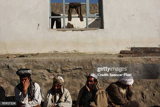 Area men participate in a weekly Shura, or meeting, at the local district center outside of Combat Outpost Zerak on January 21, 2010 in Zerak,...