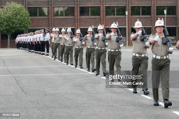 Members of the Royal Marines take part in a final rehearsal for their part in the Armed Forces' ceremonial duties at the royal wedding at on the...