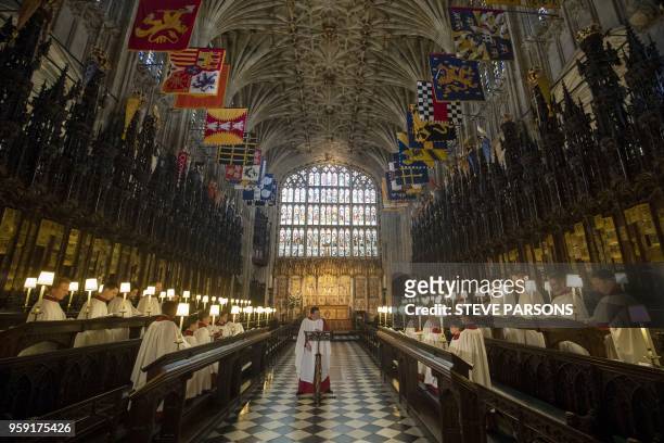 Director of Music at St George's Chapel in Windsor, James Vivian directs the St George's Chapel Choir during a rehearsal before evensong and ahead of...