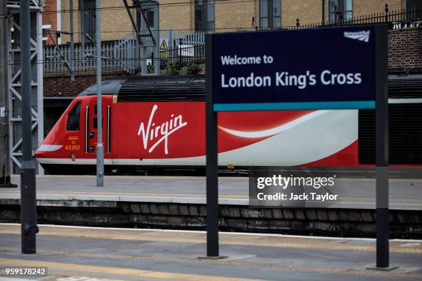 Virgin Trains East Coast train sits at Kings Cross Station on May 16, 2018 in London, England. East Coast trains are to be brought back under state...