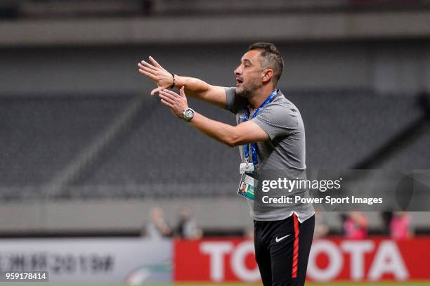 Shanghai FC Head Coach Vitor Pereira gestures during the AFC Champions League Round of 16 match between Shanghai SIPG v Kashima Antlers at the...