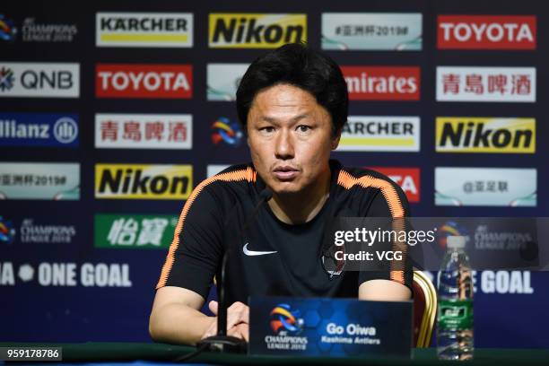 Head coach Go Oiwa of Kashima Antlers attends a press conference after the AFC Champions League Round of 16 second leg match between Shanghai SIPG...