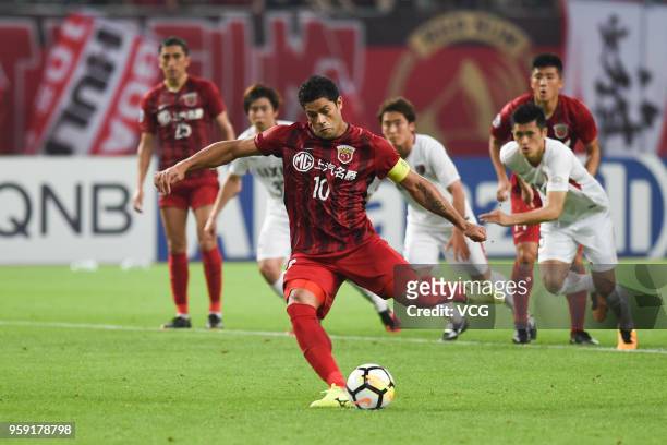 Hulk of Shanghai SIPG scores his team's second goal with a penalty during the AFC Champions League Round of 16 second leg match between Shanghai SIPG...