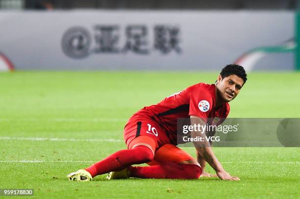 Hulk of Shanghai SIPG lies on the ground during the AFC Champions League Round of 16 second leg match between Shanghai SIPG and Kashima Antlers at...