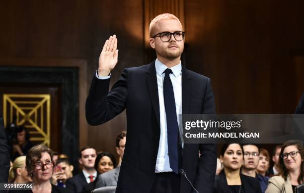 Cambridge Analytica former employee and whistleblower Christopher Wylie is sworn in before he testifies at the Senate Judiciary Committee on...