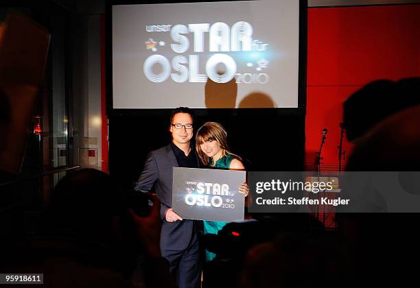 German TV host Matthias Opdenhövel and Sabine Heinrich pose for photographers prior to a press conference on January 21, 2010 in Berlin, Germany....