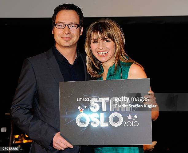 German TV hosts Matthias Opdenhövel and Sabine Heinrich pose for photographers prior to a press conference on January 21, 2010 in Berlin, Germany....