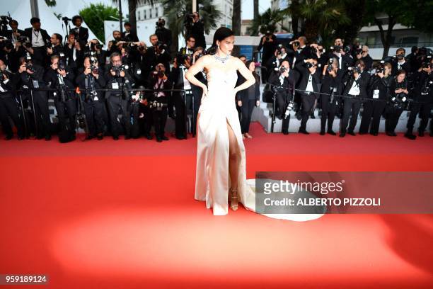 Brazilian model Adriana Lima poses as she arrives on May 16, 2018 for the screening of the film "Burning" at the 71st edition of the Cannes Film...