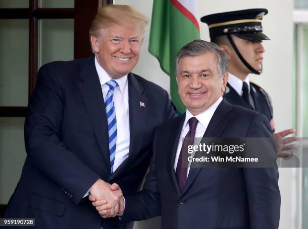 President Donald Trump greets Uzbekistan President Shavkat Mirziyoyev at the White House May 16, 2018 in Washington, DC. The two leaders are...