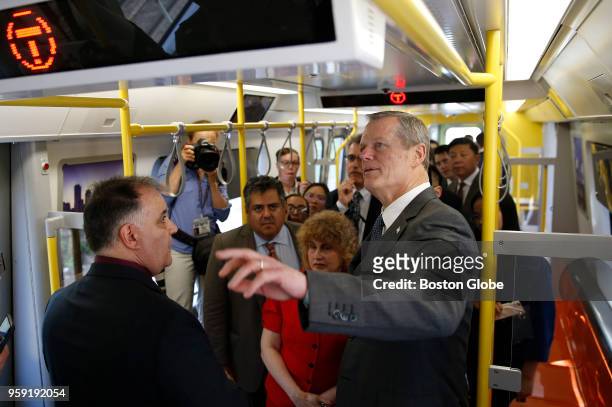 Massachusetts Governor Charlie Baker tours a new MBTA Orange Line car at Wellington Station in Medford, MA on May 15, 2018. The first new train is...