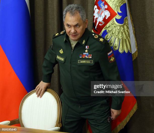 Russian Defense Minister Sergey Shoigu attends a meeting with President Vladimir Putin, high-ranking officers, defense and military officials at...