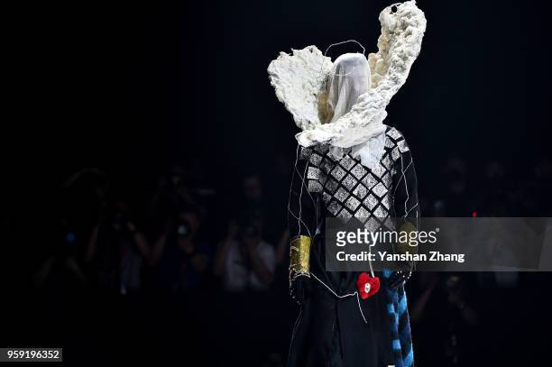 Model showcases designs on the runway at the Costume College of Hebei Academy of Fine Arts Show during the day 4 of China Graduate Fashion Week at...