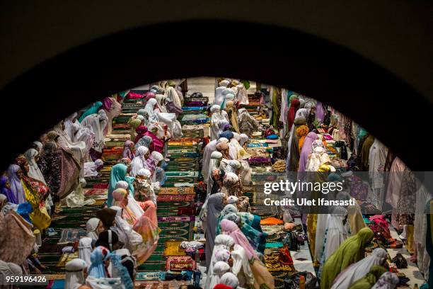 Indonesian muslims perform prayers known as Tarawih at Grand mosque on May 16, 2018 in Surabaya, Indonesia. Indonesia will begin observing Ramadan on...