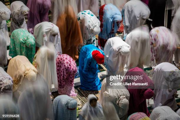 Indonesian muslims perform prayers known as Tarawih at Grand mosque on May 16, 2018 in Surabaya, Indonesia. Indonesia will begin observing Ramadan on...