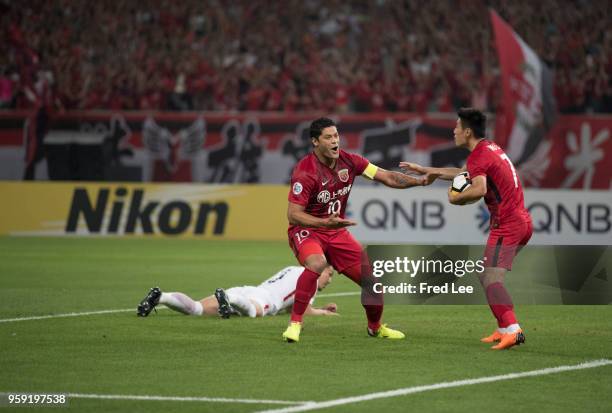 Hulk of Shanghai SIPG celebrates scoring his team's goal during the AFC Champions League Round of 16 match between Shanghai SIPG v Kashima Antlers at...