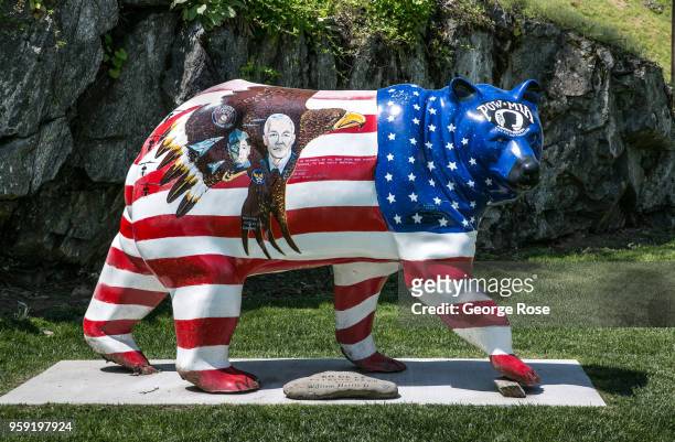 Statue of a bear is decorated with the American flag as viewed on May 11, 2018 in Cherokee, North Carolina. Located near the entrance to Great Smoky...