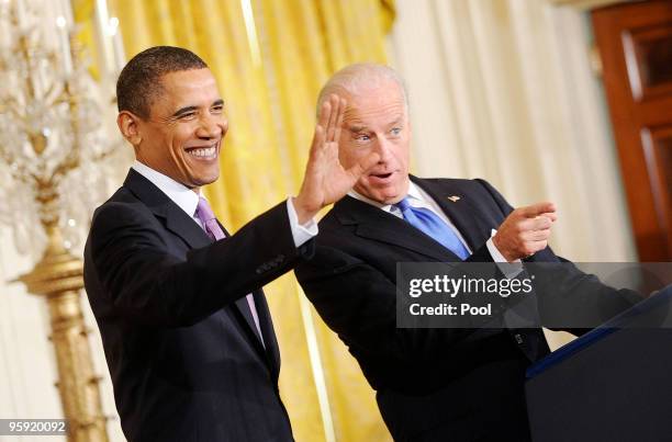 President Barack Obama and Vice President Joe Biden greet the delegation from the U.S. Conference of Mayors in the East Room on January 21, 2010 in...