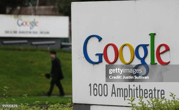 Pedestrian walks by a sign that is posted outside of the Google headquarters January 21, 2010 in Mountain View, California. Google will report fouth...