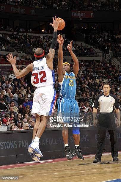 Devin Brown of the New Orleans Hornets shoots a jump shot against Richard Hamilton of the Detroit Pistons during the game at the Palace of Auburn...