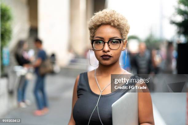 portrait of fashionable woman at city - teen lesbians stock pictures, royalty-free photos & images