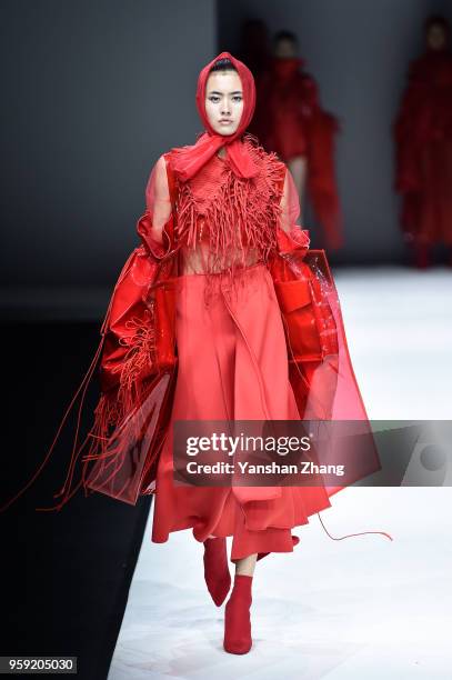 Model showcases designs on the runway at The LuXun Academy of Fine Arts Show during the day 4 of China Graduate Fashion Week at the 751 D.Park on May...