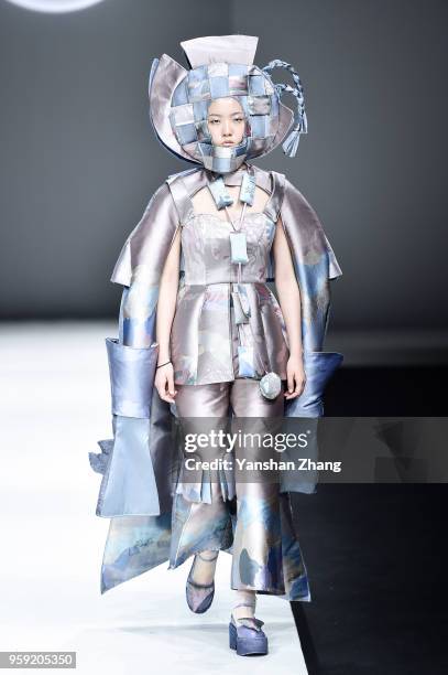 Model showcases designs on the runway at The LuXun Academy of Fine Arts Show during the day 4 of China Graduate Fashion Week at the 751 D.Park on May...