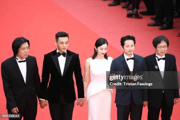 Director Chang-dong Lee, actor Ah-in Yoo, actress Jong-seo Jeon, actor Steven Yeun and Executive producer Jun-dong Lee attend the screening of...