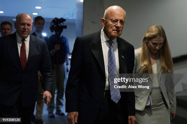 Former CIA director John Brennan and former director of National Intelligence James Clapper leave after a closed hearing before the Senate...