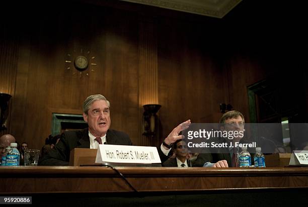 Jan 20: FBI Director Robert S. Mueller III, and Undersecretary of State for Management Patrick F. Kennedy, during the Senate Judiciary hearing on...