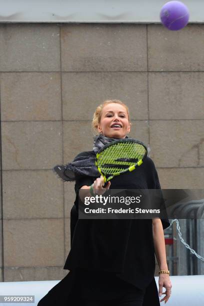 The actress Adriana Sklenarikova takes part in the "Tous En Bleu" sports workshops organised by the charity "Premiers De Cordee" at Stade de France...