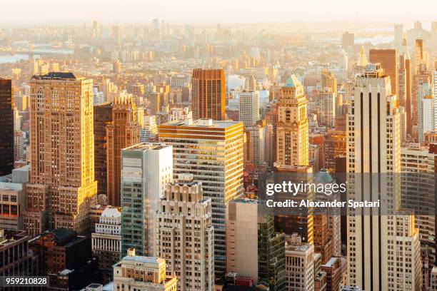 skyscrapers in manhattan aerial panoramic view during sunset, new york, usa - sunset society stock-fotos und bilder