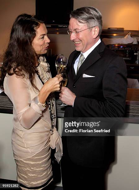 Anna von Griesheim chats with her husband Andreas Marx at the Burda Style Group Preview during the Mercedes-Benz Fashion Week Berlin Autumn/Winter...