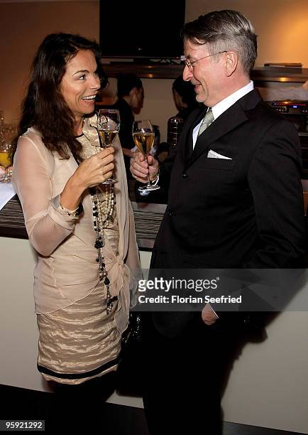Anna von Griesheim chats with her husband Andreas Marx at the Burda Style Group Preview during the Mercedes-Benz Fashion Week Berlin Autumn/Winter...