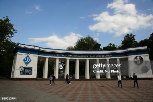 People walk past the main entrance to Valeriy Lobanovskiy Dynamo Stadium in Kyiv, Ukraine, May 15, 2018. Kyiv prepares to host UEFA Women's Champions...