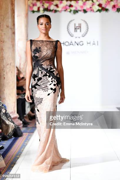 Model presents Celebrity Designer to Miss France and Miss Universe Hoang Hai of Vietnam, at season 3 of Tiffanys Red Carpet Week Cannes Fashion Show...