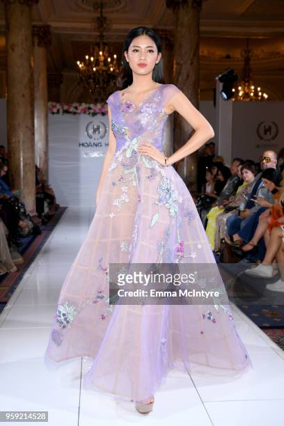 Model presents Celebrity Designer to Miss France and Miss Universe Hoang Hai of Vietnam, at season 3 of Tiffanys Red Carpet Week Cannes Fashion Show...