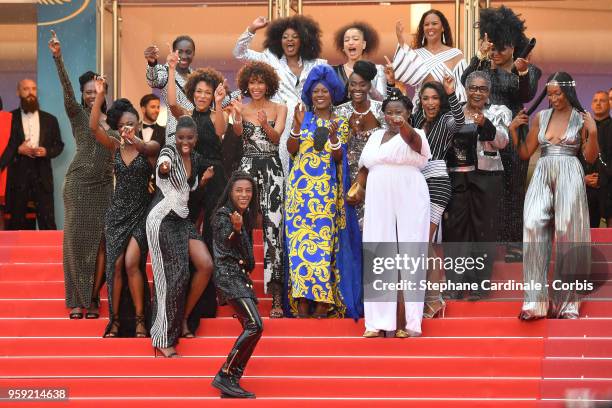 Co-Authors of the book "Noire N'est Pas Mon Métier" pose on the stairs at the screening of "Burning" during the 71st annual Cannes Film Festival at...