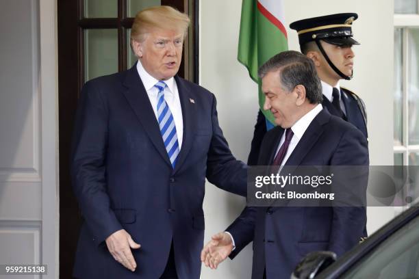 President Donald Trump, left, greets Shavkat Mirziyoev, Uzbekistan's president, ahead of a bilateral meeting at the White House in Washington, D.C.,...