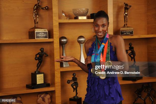 Former WNBA player Lisa Leslie poses for a photo at her home on November 28, 2009 in Los Angeles, California. NOTE TO USER: User expressly...