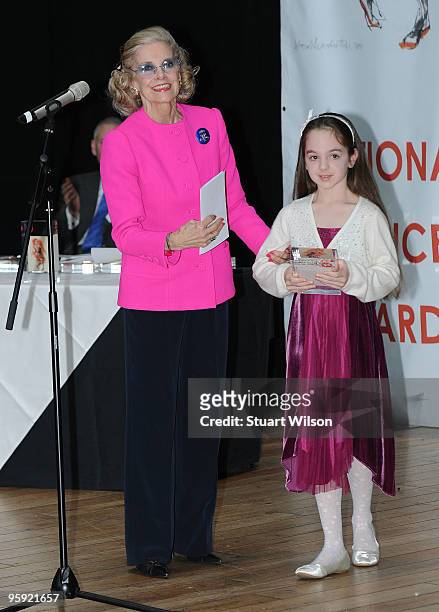Dancer Lucy Wood receives the Angelina Ballerina Childrens Award from Doreen Wells at the Critic's Circle National receives the Angelina Ballerina...