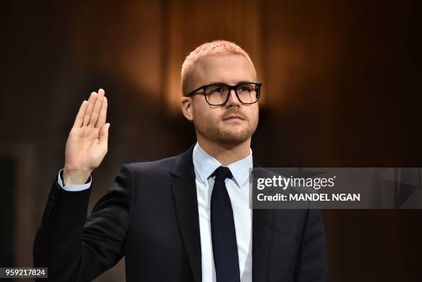 Cambridge Analytica former employee and whistleblower Christopher Wylie is sworn in before he testifies at the Senate Judiciary Committee on...