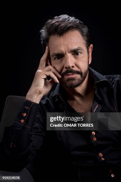 Mexican actor Eugenio Derbez, who stars in the movie "Overboard" , poses for pictures during an interview with AFP in Mexico City on May 14, 2018.