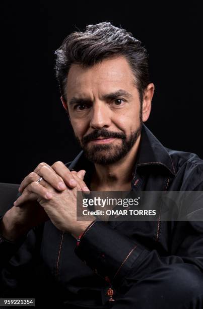 Mexican actor Eugenio Derbez, who stars in the movie "Overboard" , poses for pictures during an interview with AFP in Mexico City on May 14, 2018.