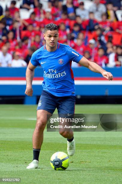 Hatem Ben Arfa runs with ball during a Paris Saint-Germain training session at Parc des Princes on May 16, 2018 in Paris, France.